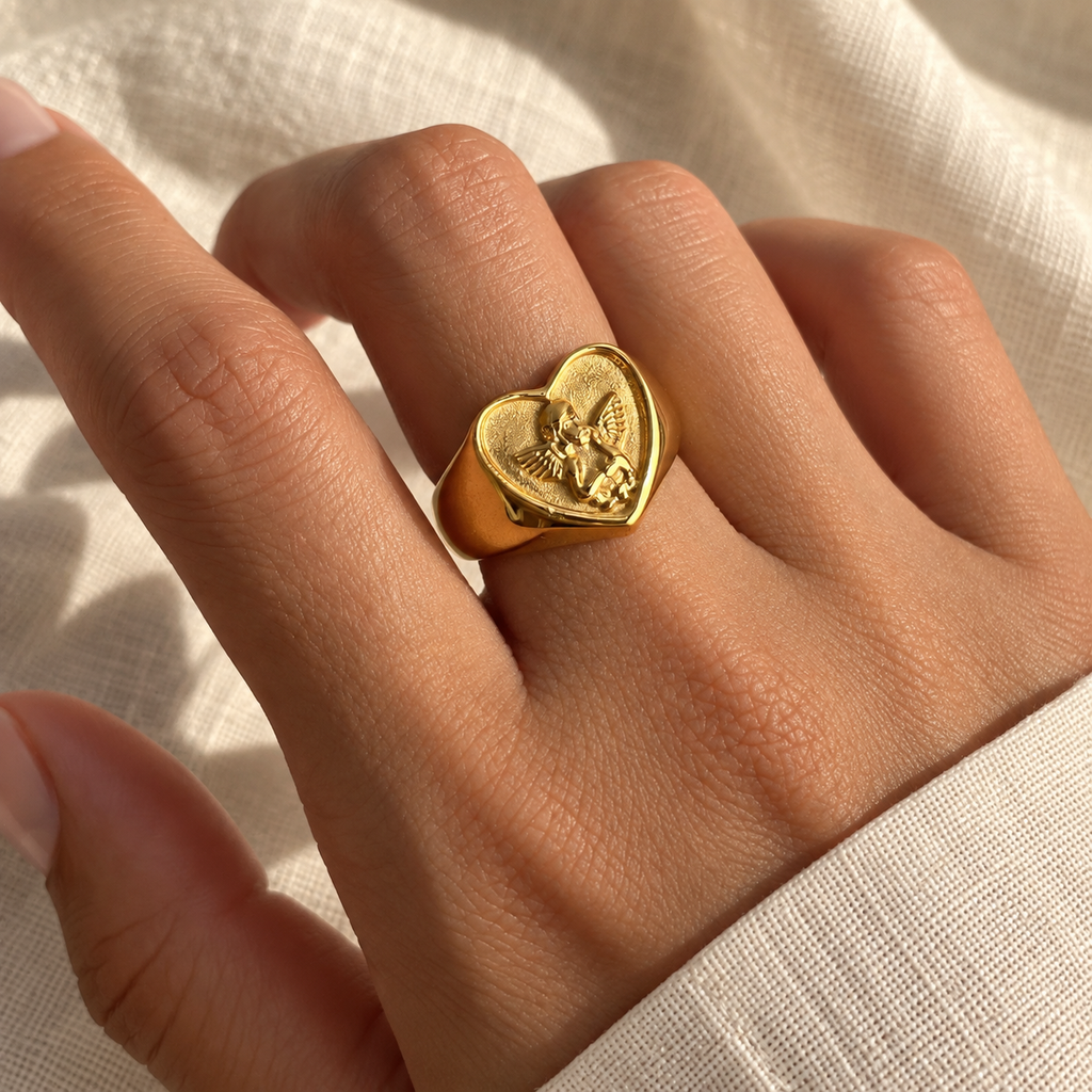 Cherielle Cherub Heart Signet Ring — worn at realistic scale