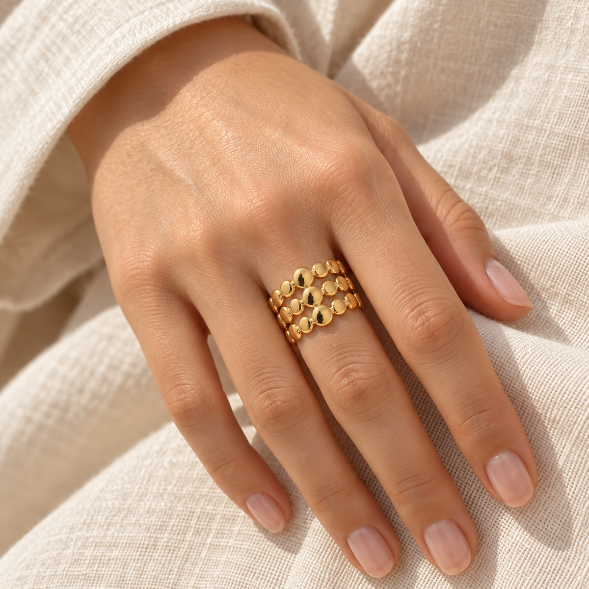 Circelline Triple Disc Ring — worn at realistic scale