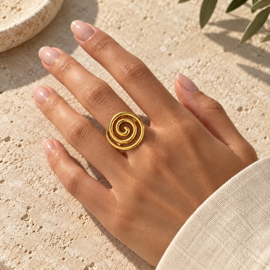 Orevielle Open Spiral Ring — worn at realistic scale