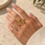 Orevielle Open Spiral Ring — worn at realistic scale